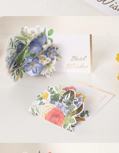Detailed 3D pop-up greeting cards featuring vibrant blue and red watercolor floral bouquets