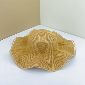 Handmade khaki straw sun hat with elegant lace-edge brim for summer beach travel