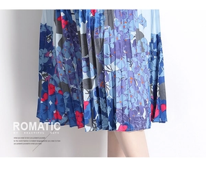 Detail of blue and purple floral pleated skirt with lightweight chiffon fabric texture