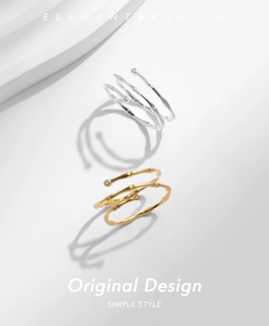 Nahaufnahme der mehrschichtigen Bambusringe in eleganter Gold- und Silberoptik
