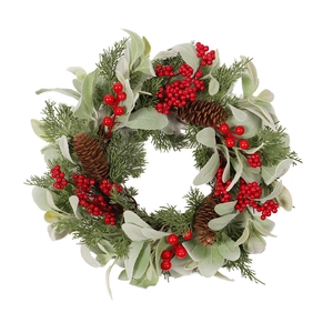 Artificial Christmas wreath with pine cones and red berries on green pine leaves