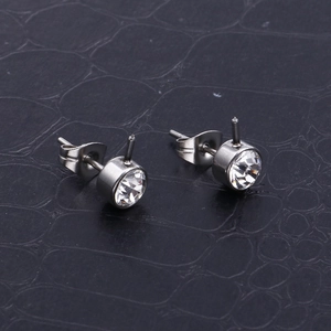 Elegant silver stainless steel stud earrings featuring round clear cubic zirconia stones