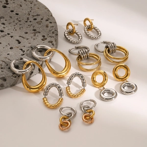 Minimalist two-tone stainless steel hoop earrings in gold and silver finish