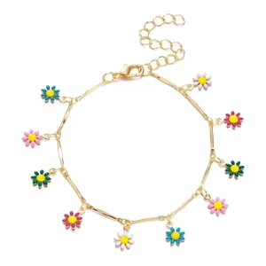 Macro detail of gold daisy bracelet showing colorful enamel petals and adjustable chain