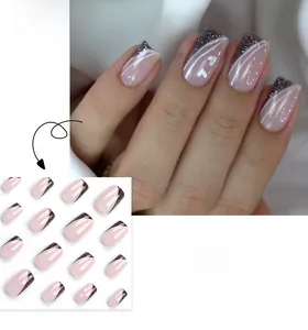 Detail of pink square press-on nails with white French lines and silver glitter hearts
