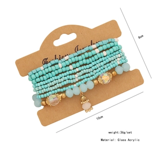 Detail view of multi-layer Bohemian beaded bracelet set with size and weight labels
