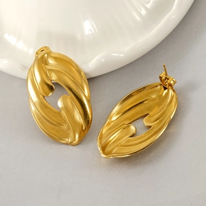 Elegant 18K gold-plated stainless steel hollow leaf earrings with a twisted oval design