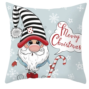 Detail of Christmas gnome pillowcase featuring soft peach skin fabric and Merry Christmas text
