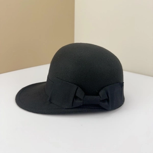 Classic black wool felt equestrian hat for women with a delicate ribbon bow accent