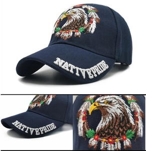 Detail view of navy blue baseball cap with eagle embroidery and Native Pride text