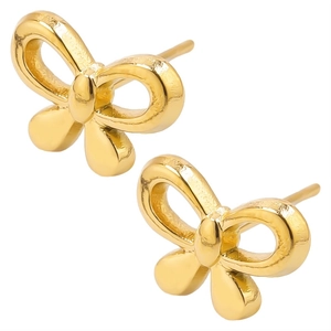 Close-up of golden stainless steel bow stud earrings with a high-polished metallic finish