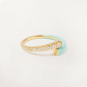 Detail of 18K gold hallmark engraving on a pavé zircon and teal enamel ring