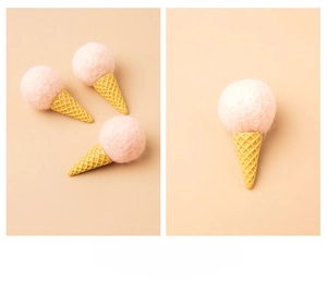 Detail view of mini pink wool felt ice cream ornaments for DIY Christmas tree decoration