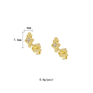 Detail showing geometric gold stud earrings with dimensions 4mm by 7.4mm and zircon inlay