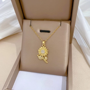 Elegant sunflower pendant necklace in gold finish with sparkling zircon stones