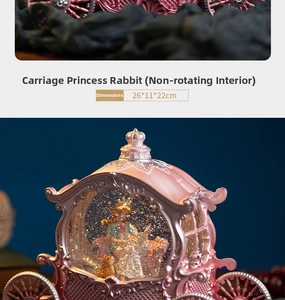 Detailed size view of princess carriage snow globe music box measuring 26x11x22cm
