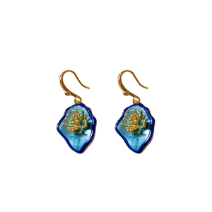 Vintage gold-plated flower earrings with blue enamel petals and zircon crystal accents
