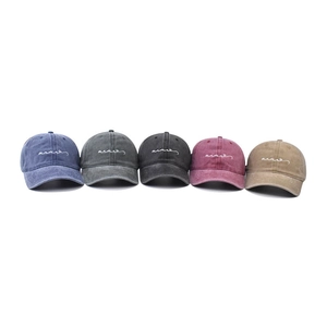 Vintage washed cotton baseball caps with cursive embroidery in five assorted colors