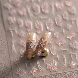 Iridescent laser butterfly nail stickers and press-on nails with 3D floral accents