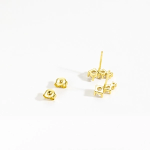 Macro view showing the S925 hallmark on gold plated sterling silver stud earrings
