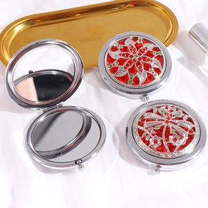 Vintage silver folding makeup mirror set with red floral filigree and dragonfly pattern