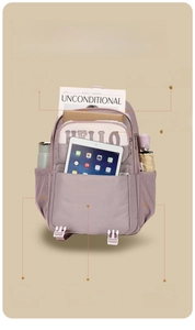 Detail view of purple waterproof student backpack showing large capacity for 15.6 inch laptop