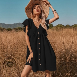 Detail of ruffled sleeves and front button closure on a black V-neck summer dress