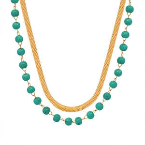 Double-layered titanium steel necklace with gold snake chain and turquoise beads on white background