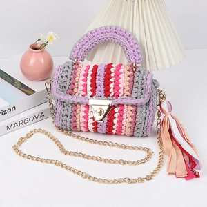 Handmade woven crossbody bag with colorful crochet stripes and gold chain strap