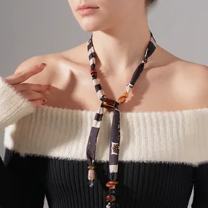 Chic checkered fabric and wooden beaded necklace for women in minimalist style