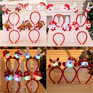 Festive Christmas LED headbands with Santa, reindeer, and snowman designs for holiday parties
