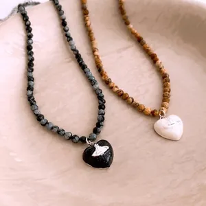 Vintage heart bead necklaces with planet charms in black and brown stone options