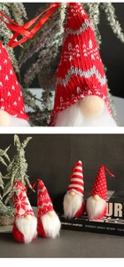 Close-up of four knitted faceless forest gnome hanging ornaments for Christmas tree decoration