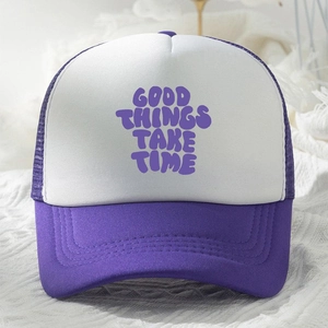 Detail of Good Things Take Time purple trucker hat with white front and mesh back