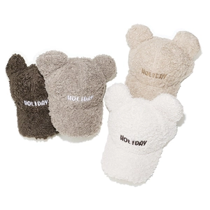 Detail of four fuzzy lamb wool baseball caps with cute bear ears and Holiday embroidery
