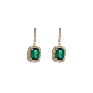Elegant gold earrings with emerald green square gemstones and pavé diamond detailing