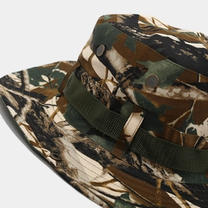 Detail of tactical camo boonie hat featuring metal mesh vents and nylon webbing strap
