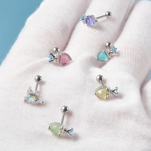 Polished steel heart stud earrings with colorful cat-eye stones in various pastel colors