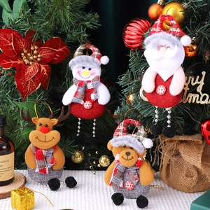 Charming Christmas plush ornaments including Santa, snowman, and reindeer for holiday trees