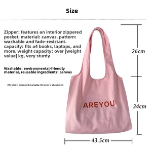 Detailed size chart for pink canvas tote bag showing height, width, and strap drop dimensions