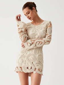 Chic cream paisley crochet mini dress with long flared sleeves and round neckline