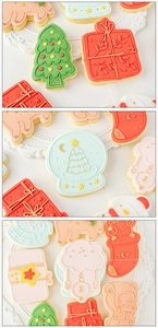 Macro shot of assorted Christmas fondant cookies in shapes like tree and gift box