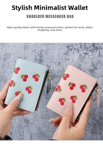 Detailed close-up of cherry embroidery on pink and blue litchi pattern leather wallets