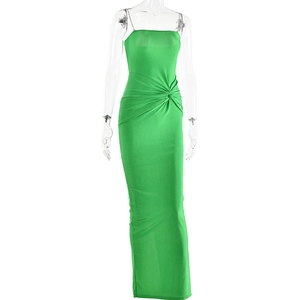 Detail of green maxi dress featuring side knot draping and metallic chain straps