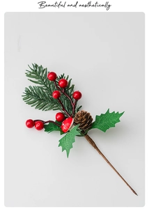 Detail of Christmas spray with pine needles, red berries, and natural pinecone