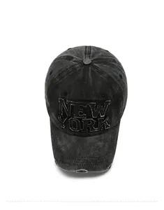 Top view of vintage washed baseball cap with New York distressed applique embroidery