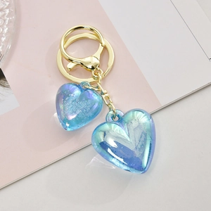Creative acrylic double heart keychain with iridescent blue finish and gold lobster clasp
