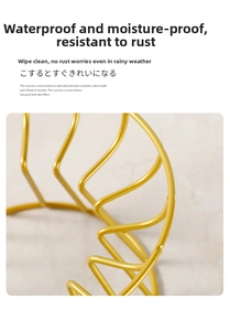 Close-up of waterproof gold metal stand with rust-resistant finish for ceramic pet bowls