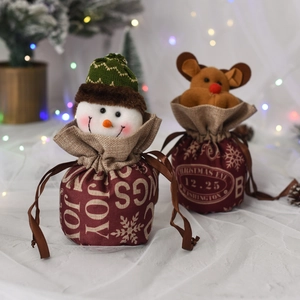 Christmas apple gift bag with plush snowman and elk dolls in festive burgundy velvet fabric