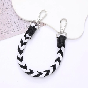 Elegant black and white woven phone strap with durable metal lobster clasps for bags